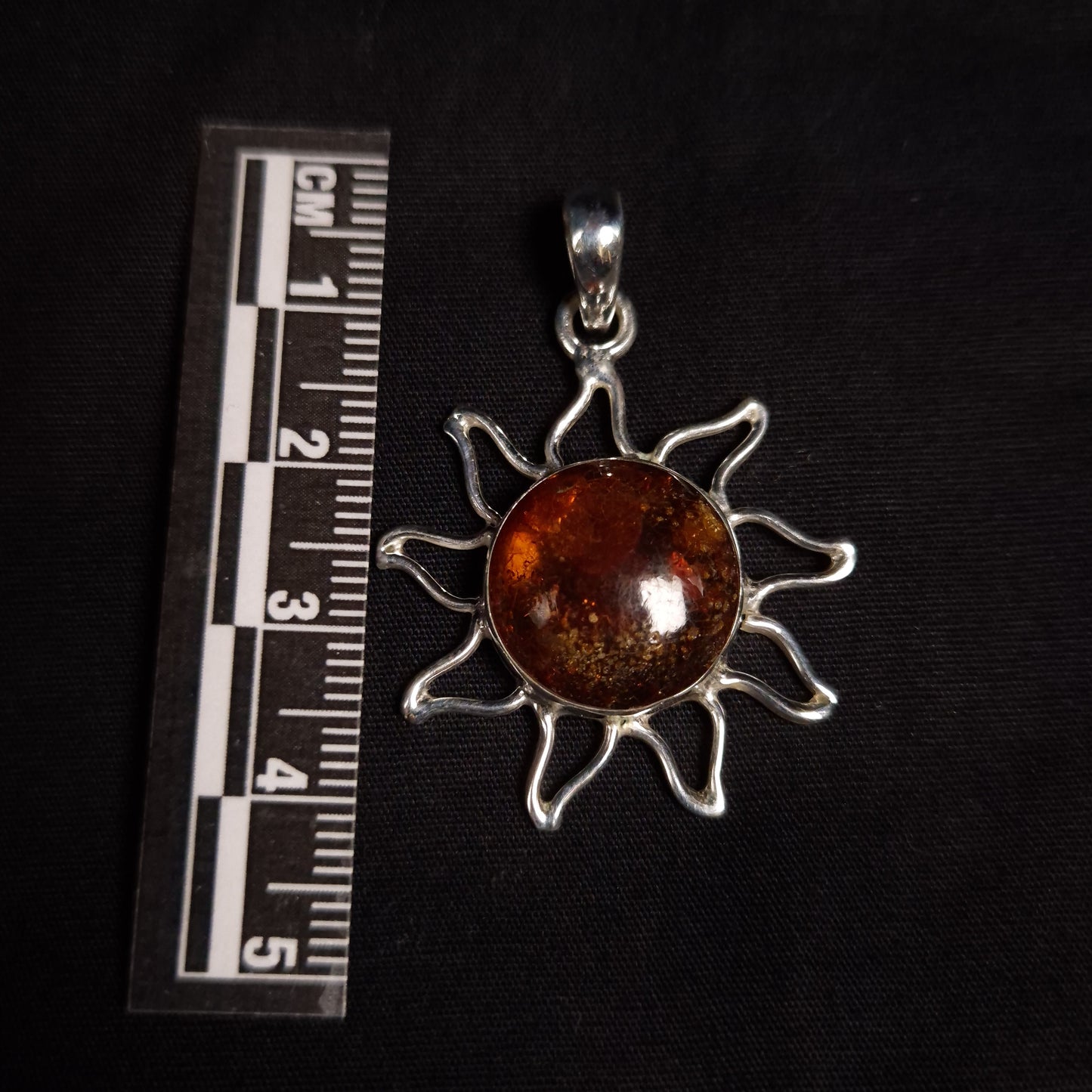 Amber Sun Pendants