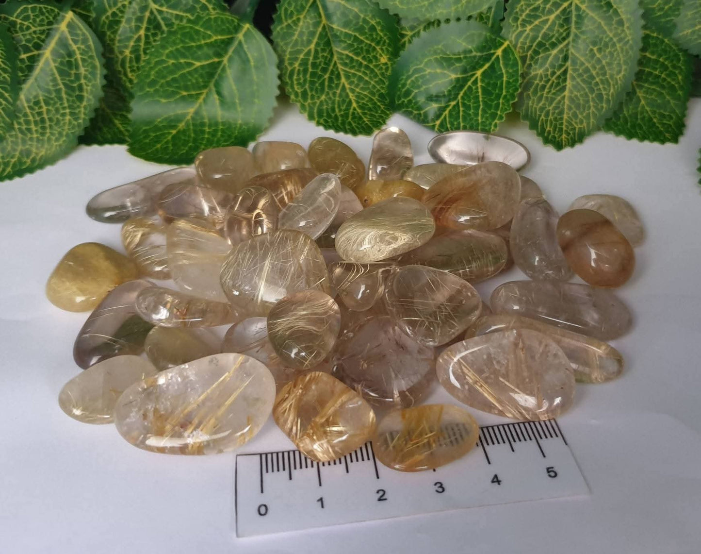 HIGH GRADE RUTILE QUARTZ TUMBLES - 200G
